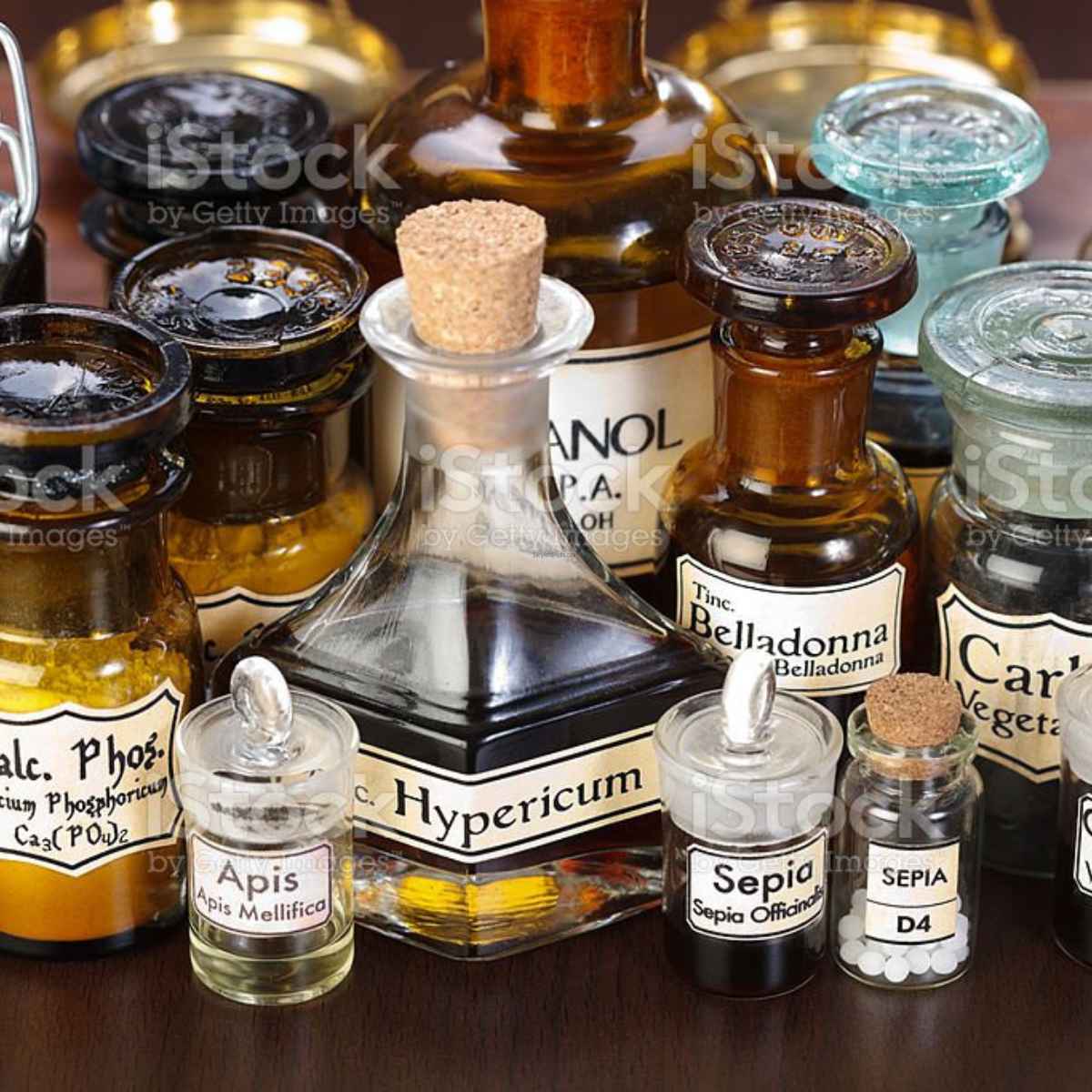 A number of bottles having homeopathy medicines